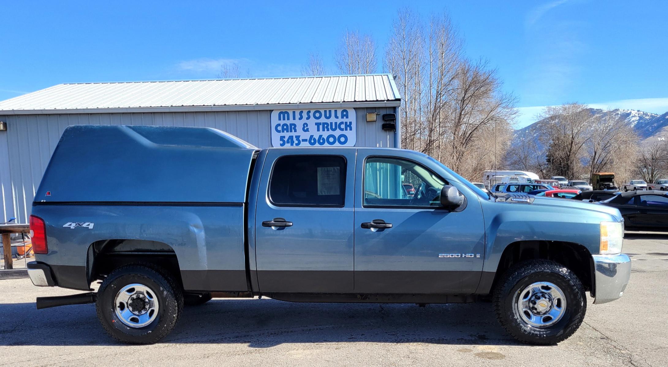 2008 Blue /Tan Chevrolet Silverado 2500HD LT (1GCHK23628F) with an 6.6L engine, 5 Speed Automatic transmission, located at 450 N Russell, Missoula, MT, 59801, (406) 543-6600, 46.874496, -114.017433 - 6.6 Duramax Diesel. Automatic Transmission. 4WD. Matching leer Topper. New Tires. AM FM CD. Power drivers Seat. Air Cruise Tilt. - Photo #0